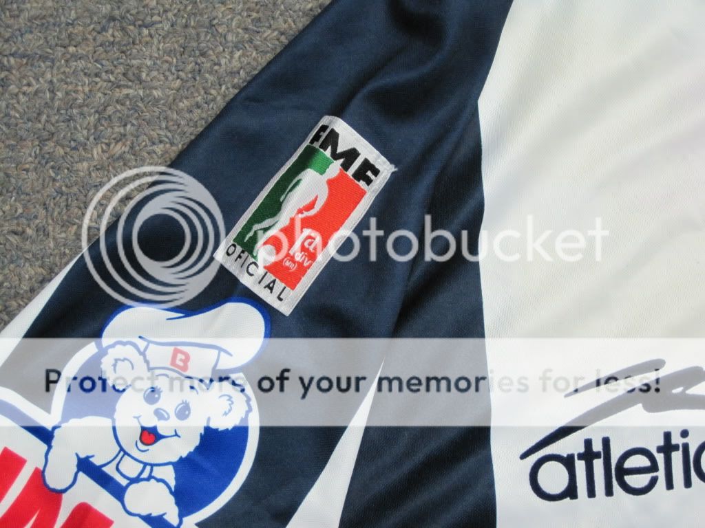   jersey has an embroidered team crest and Atletica brand logo